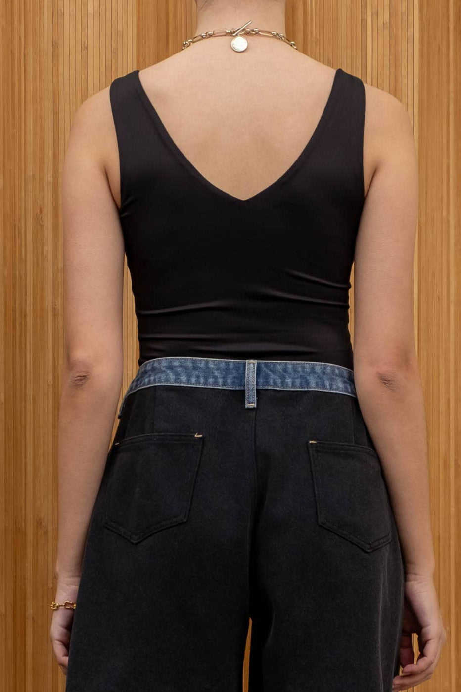 CENA REVERSIBLE V NECK SLEEVELESS BODYSUIT - BLACK